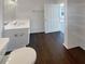 Bright bathroom with white vanity, shelving, and tile flooring, creating a clean and functional space at 201 Gallant Se Ln # 25, Mableton, GA 30126