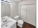 Bright bathroom with vinyl floors, single sink vanity, and modern lighting at 201 Gallant Se Ln # 25, Mableton, GA 30126