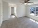 Cozy bedroom featuring plush carpeting, a ceiling fan, and a closet, offering comfort and functionality at 201 Gallant Se Ln # 25, Mableton, GA 30126
