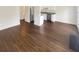 Open-concept living space with hardwood floors, seamlessly connects to the kitchen with stainless appliances at 201 Gallant Se Ln # 25, Mableton, GA 30126
