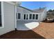 Backyard with a concrete patio area, perfect for outdoor entertaining and relaxation at 3577 Fishpond Cir, Dacula, GA 30019