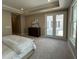 Inviting bedroom with ample space, natural light, and access to the outdoors at 3577 Fishpond Cir, Dacula, GA 30019