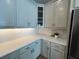 Bright kitchen boasts plentiful counter space and a suite of stainless steel appliances at 3577 Fishpond Cir, Dacula, GA 30019