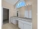 Bathroom featuring double sink vanity with granite countertop and a large mirror at 424 Eglington Trl, Locust Grove, GA 30248