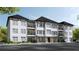Two-story building with white siding, black shutters, and a covered entrance at 1000 Blair Ln # 1, Peachtree City, GA 30269