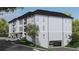 Apartment building showcasing the side view with parking and landscaping at 1000 Blair Ln # 1, Peachtree City, GA 30269