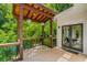 Covered deck section with access to the pool at 10700 Stroup Rd, Roswell, GA 30075