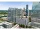 Cityscape showcasing modern high-rise buildings, surrounding greenery, and the city's vibrant atmosphere at 3325 Piedmont Ne Rd # 1801, Atlanta, GA 30305