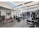Spacious gym with modern equipment and large windows providing natural light and cityscape views at 3325 Piedmont Ne Rd # 1801, Atlanta, GA 30305
