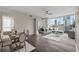 Bright living area with a dining space, hard wood floors, and amazing views of the surrounding skyscrapers at 3325 Piedmont Ne Rd # 1801, Atlanta, GA 30305