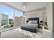 This elegant bedroom boasts floor to ceiling windows with plenty of sunlight and beautiful city views at 3325 Piedmont Ne Rd # 1801, Atlanta, GA 30305