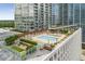 Aerial shot of rooftop pool area with landscaping, seating, and city views at 3325 Piedmont Ne Rd # 1801, Atlanta, GA 30305
