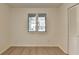 Bedroom with view of neighborhood through window and adjacent closet at 882 Cedar Canyon Se Sq, Marietta, GA 30067