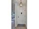 Elegant white front door with decorative hardware and a classic light fixture above at 882 Cedar Canyon Se Sq, Marietta, GA 30067
