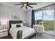 Bright bedroom with city view, large bed, and modern decor at 3300 Windy Ridge Se Pkwy # 813, Atlanta, GA 30339