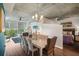 Elegant dining room with a large table and modern lighting at 3300 Windy Ridge Se Pkwy # 813, Atlanta, GA 30339