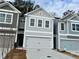 Charming new construction townhome with a two-car garage and a beautifully designed exterior at 5150 Longview Run, Decatur, GA 30035