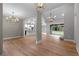 Bright dining room with hardwood floors and chandelier at 136 Rainey Rd, Temple, GA 30179