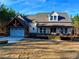 Craftsman style home with stone accents and a large front porch at 136 Rainey Rd, Temple, GA 30179