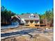 Craftsman style home with stone accents and a two-car garage at 136 Rainey Rd, Temple, GA 30179