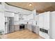 Sleek kitchen with stainless steel appliances, modern cabinetry, and hardwood floors for a contemporary feel at 3324 Peachtree Ne Rd # 2706, Atlanta, GA 30326