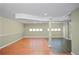 Spacious finished basement with hardwood floors and recessed lighting at 5620 Orly Ter, College Park, GA 30349