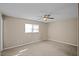 Spacious bedroom with neutral carpeting and large window at 5620 Orly Ter, College Park, GA 30349