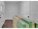 Renovated entry with new flooring and exposed brick wall at 4340 W Linda Dr, Douglasville, GA 30134
