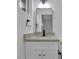 Modern bathroom with granite countertop and black fixtures at 4340 W Linda Dr, Douglasville, GA 30134