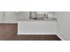 Updated kitchen has white cabinets with granite countertops and stainless appliances at 4340 W Linda Dr, Douglasville, GA 30134