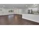 Open concept space boasts new floors, fresh paint, and stainless steel appliances at 4340 W Linda Dr, Douglasville, GA 30134