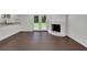 Open concept living room features a fireplace and french doors to the backyard at 4340 W Linda Dr, Douglasville, GA 30134