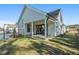 Home with covered patio and fenced backyard at 495 Pearl St, Cumming, GA 30040
