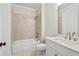 Clean bathroom with white vanity and tile shower/tub at 495 Pearl St, Cumming, GA 30040