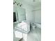 Well-lit bathroom featuring a large mirror, modern vanity, subway tile, and a shower-tub combination at 4440 Sims Park Overlook, Suwanee, GA 30024