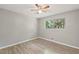 Bright bedroom featuring wood-look floors and a window at 1974 Skyview Cir, Douglasville, GA 30135