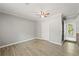 Spacious bedroom with ceiling fan and wood-look flooring at 1974 Skyview Cir, Douglasville, GA 30135