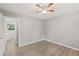 Bedroom with ceiling fan and access to bathroom at 1974 Skyview Cir, Douglasville, GA 30135