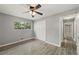 Bedroom with ceiling fan and access to hallway at 1974 Skyview Cir, Douglasville, GA 30135