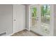 French doors open to a deck, perfect for outdoor entertaining at 1974 Skyview Cir, Douglasville, GA 30135