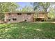 Ranch house with a deck and private backyard at 1974 Skyview Cir, Douglasville, GA 30135