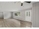 Spacious living room with hardwood floors and neutral walls at 1974 Skyview Cir, Douglasville, GA 30135