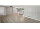 Open concept living area with hardwood floors and access to kitchen at 1974 Skyview Cir, Douglasville, GA 30135