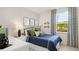 Bedroom featuring soccer decor, neutral paint, and natural light at 570 Silver Moon Dr, Loganville, GA 30052