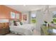 Comfortable bedroom featuring a stylish decor, a window view, and a sleek modern style dresser at 570 Silver Moon Dr, Loganville, GA 30052