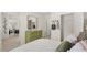 Inviting bedroom showcasing calming colors, natural lighting, and a modern dresser at 570 Silver Moon Dr, Loganville, GA 30052