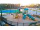 Beautiful community playground offering recreational amenities with a tennis court, and picnic area at 570 Silver Moon Dr, Loganville, GA 30052