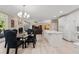 Bright open-concept living space with the kitchen and dining area at 2010 Stonehedge Rd, Roswell, GA 30075