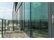 Private balcony with glass railings and city views at 788 W Marietta Nw St # 1707, Atlanta, GA 30318