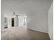 Bonus room featuring neutral carpet, a ceiling fan and natural lighting at 3384 Brookside Ln, Jonesboro, GA 30236